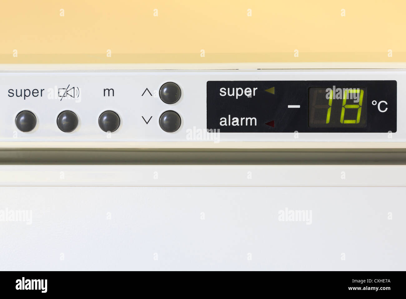 Upright freezer control panel showing a temperature at minus 18 degrees Stock Photo