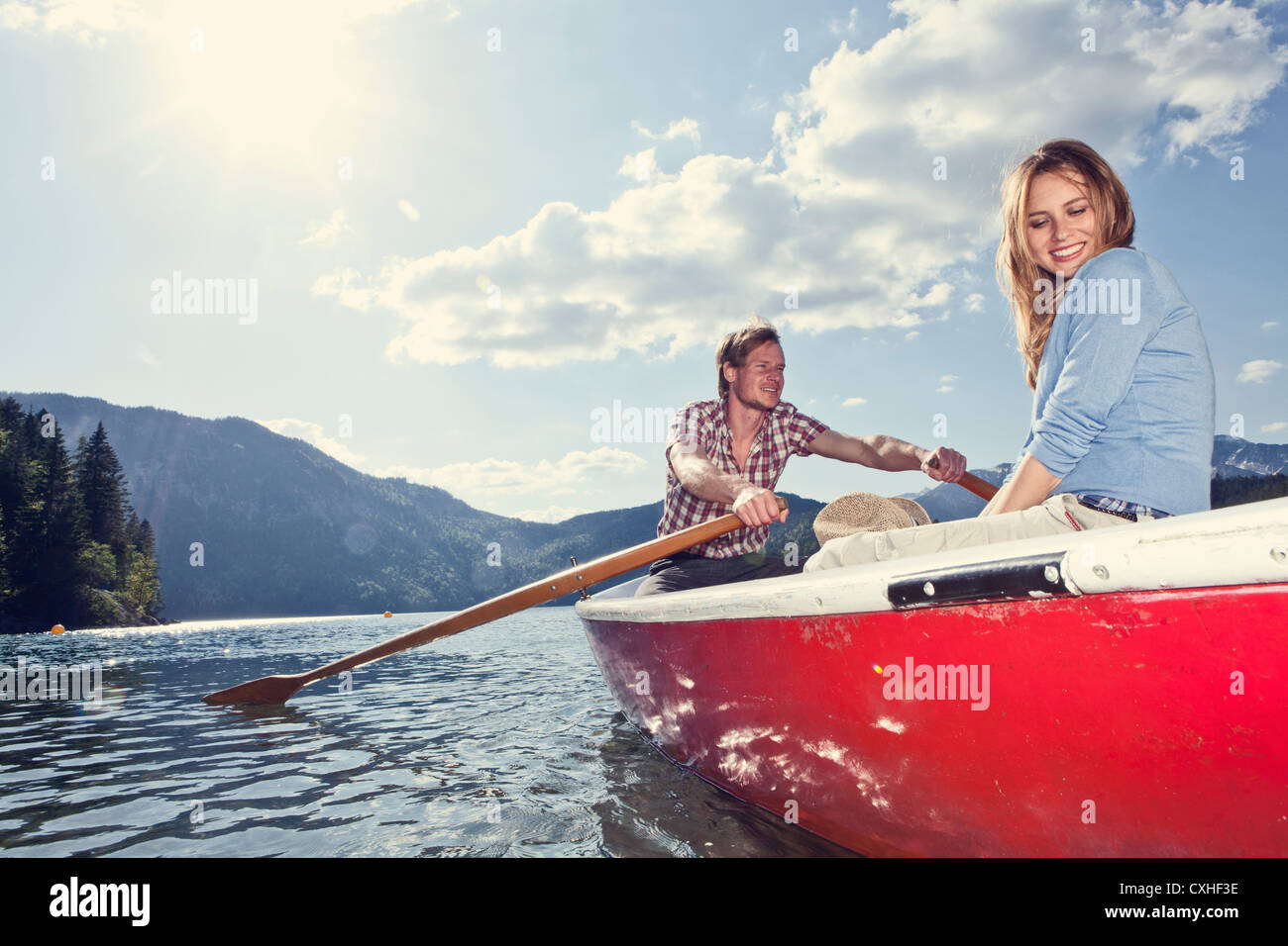 Germany, Bavaria, Couple in rowing boat, smiling Stock Photo