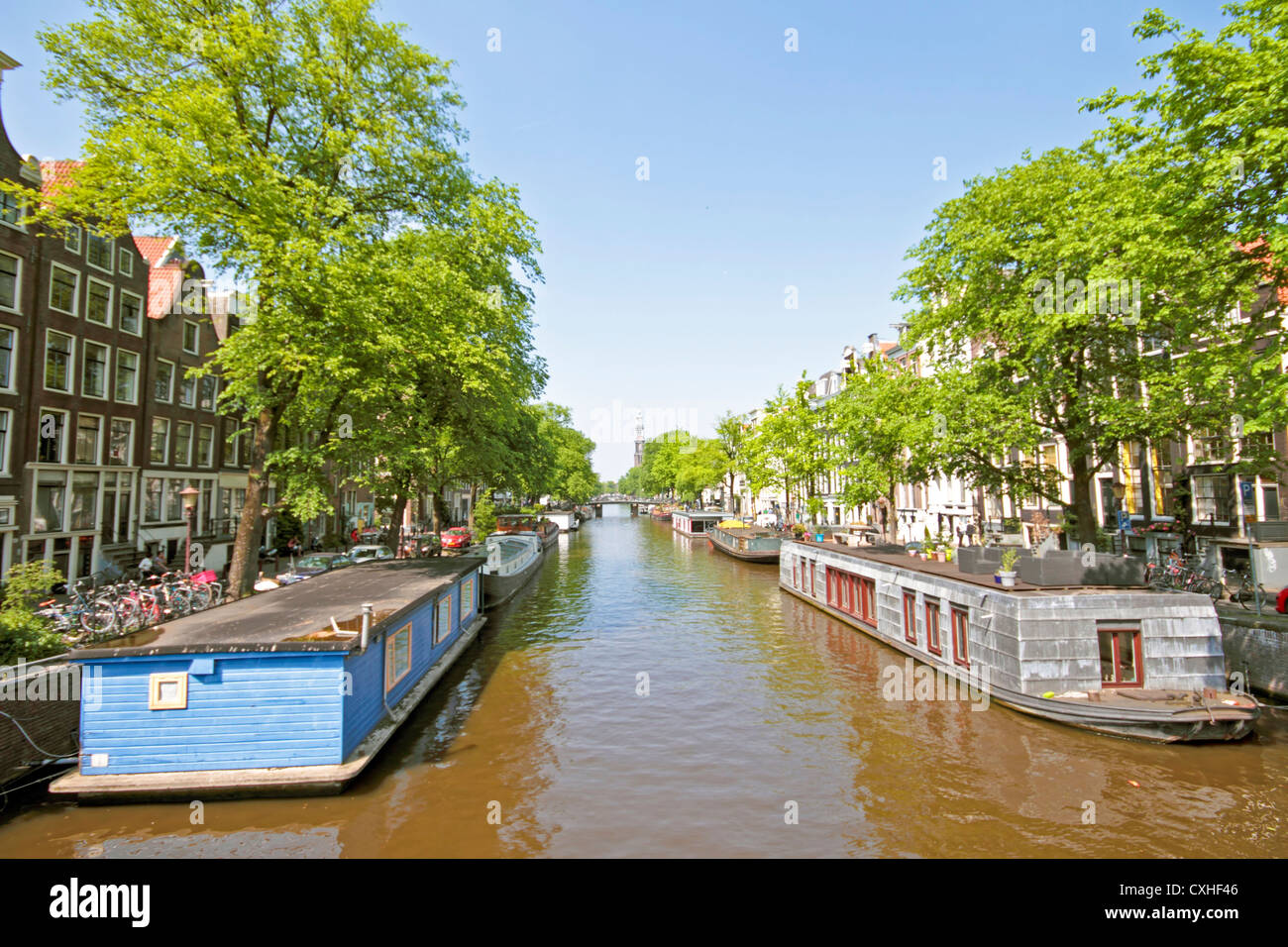 Houseboats in the canals in Amsterdam the Netherlands Stock Photo