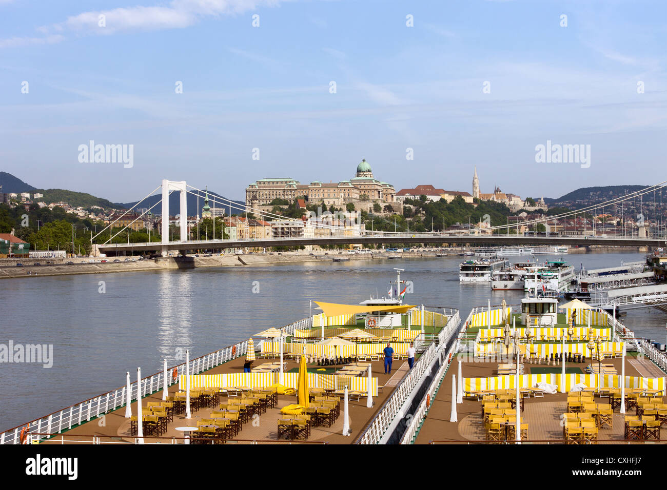 Passenger boats with restaurant on deck, docked on the Danube river in Budapest, Hungary. Stock Photo