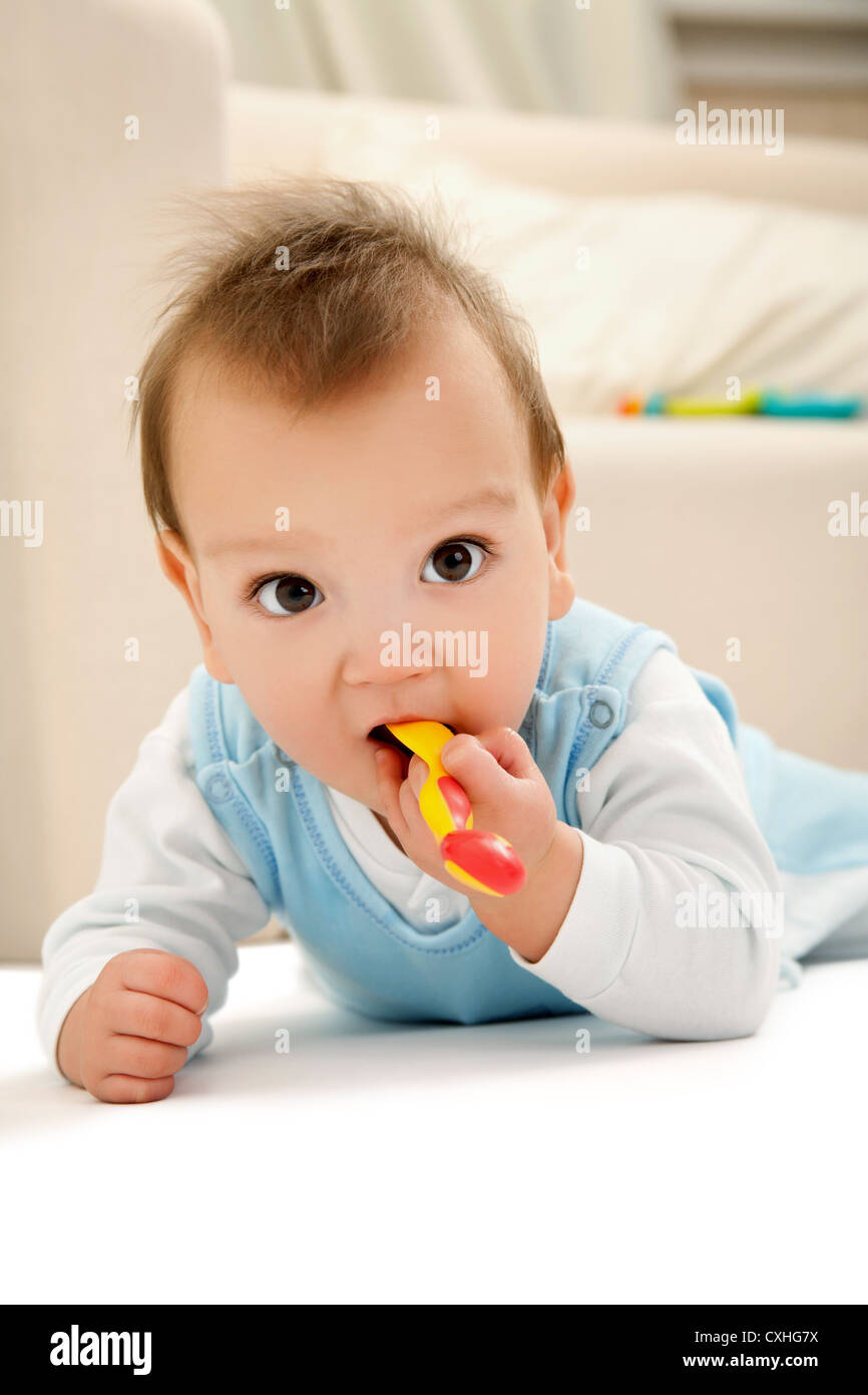 baby with spoon Stock Photo - Alamy
