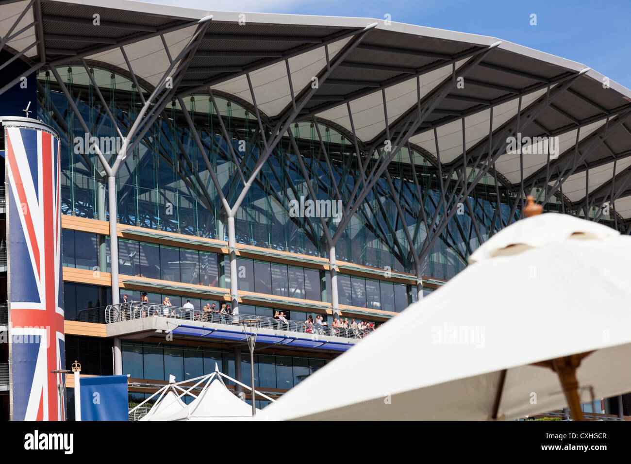 British Union Jack flag on the Ascot Racecourse Grandstand in glorious sunlight. Berkshire, England, UK. Stock Photo