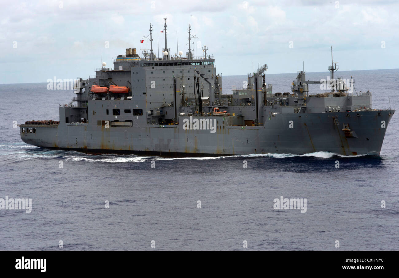 The Military Sealift Command dry cargo and ammunition ship USNS Amelia Earhart (T-AKE 6) transits the Philippine Sea prior to pulling alongside the forward-deployed amphibious assault ship USS Bonhomme Richard (LHD 6) to conduct a replenishment at sea. Bonhomme Richard, commanded by Capt. Daniel Dusek, is the lead ship of the only forward-deployed amphibious ready group and is currently operating in the 7th Fleet area of operations. Stock Photo