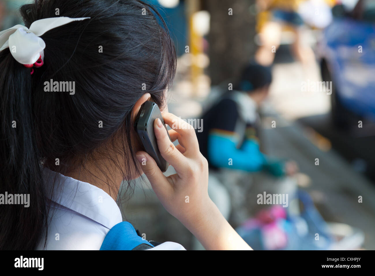 Woman on the Phone in Chiang Mai Stock Photo