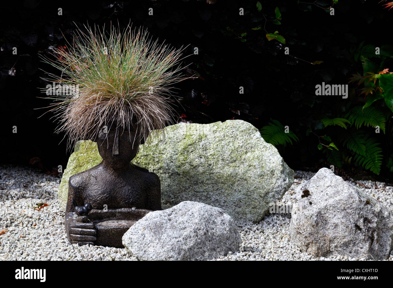 statue with grass hair garden gardening design sculpture figure