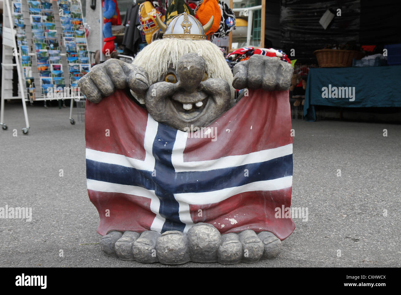 Statue of a troll in Geiranger, Norway. A troll is a supernatural being in Norwegian mythology and Scandinavian folklore. Stock Photo