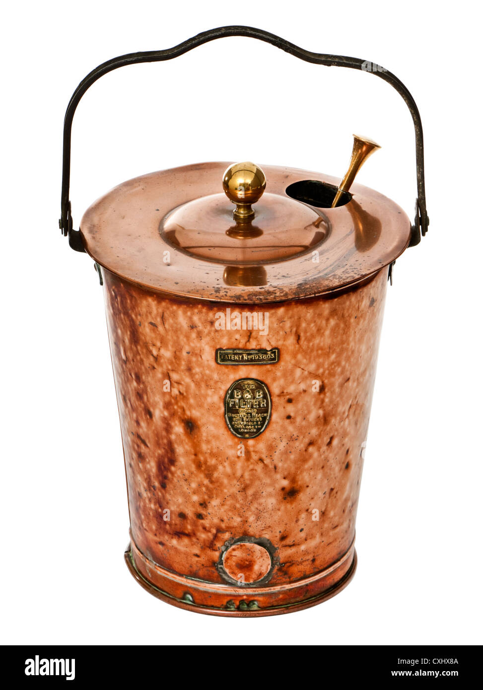 Antique converted copper coal bucket. This was converted from a B&B filter used in pubs and was made by Buckley & Beach. Stock Photo
