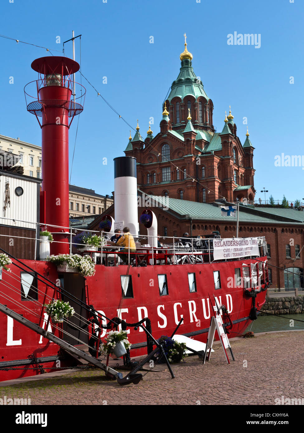 Helsinki bar restaurant boat 'Relanders Grund'  restaurant boat with Russian church behind Helsinki Finland Stock Photo