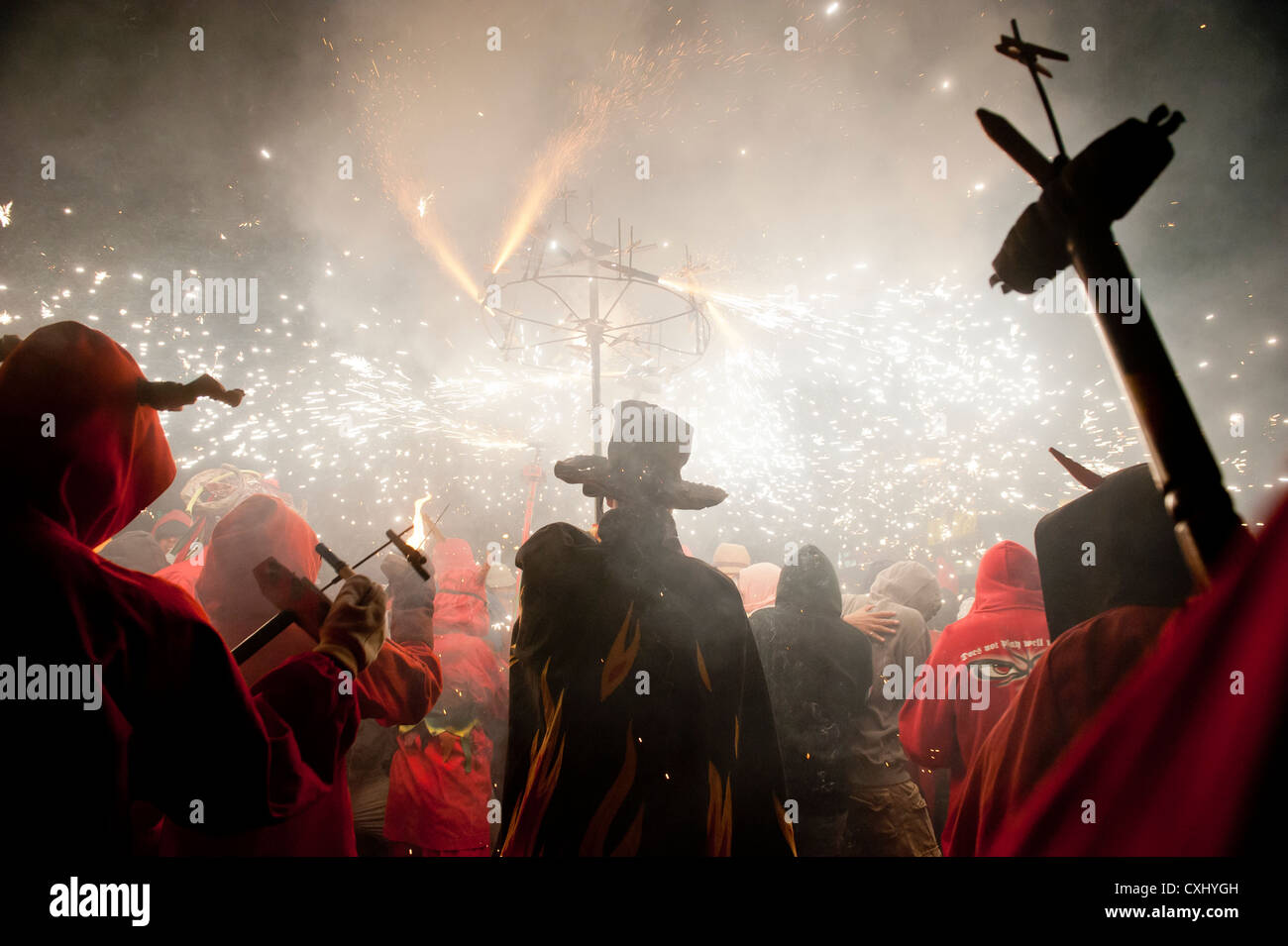Participants in the traditional Correcfoc in the streets of Barcelona ...