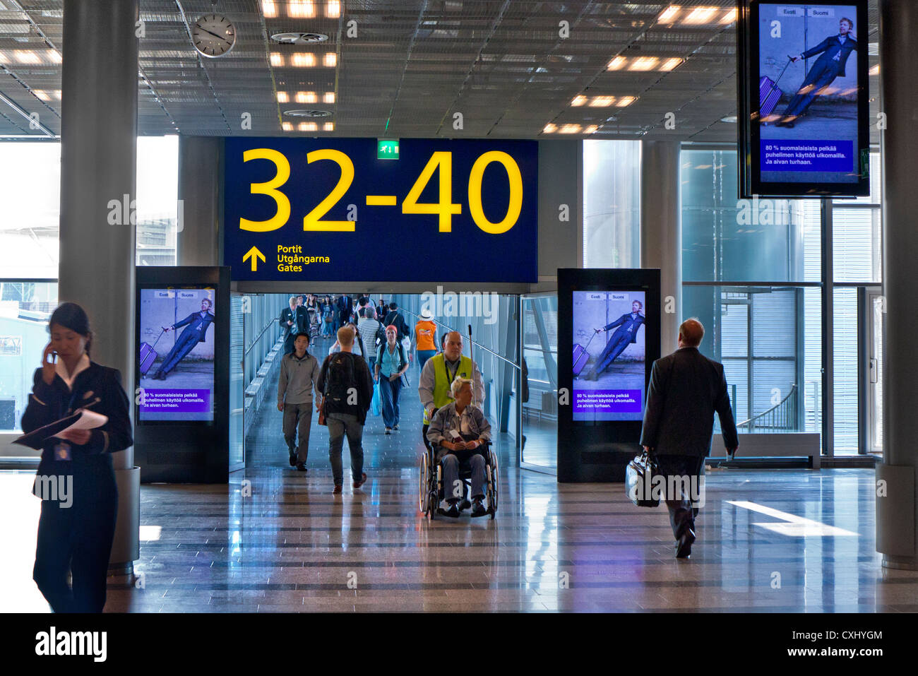 Airport concourse to departure boarding gates at Vantaa Helsinki airport Finland Stock Photo