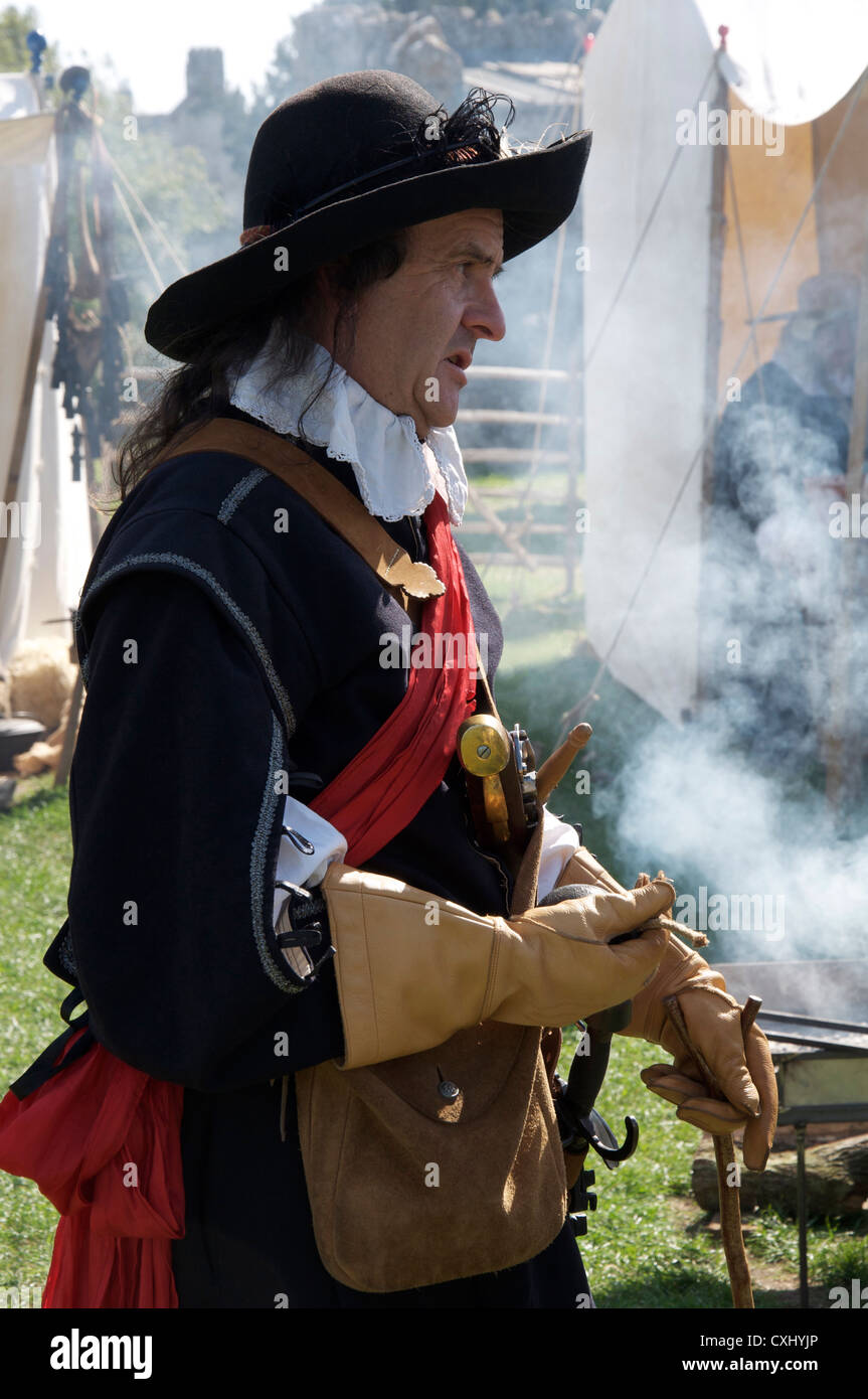 An English Civil War reenactor portrays the commander of the defending