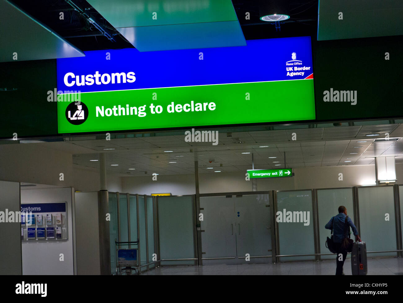 CUSTOMS & EXCISE UK Green Channel 'nothing to declare' & scrutiny security passenger UK Border Agency entry point at London Heathrow Airport UK Stock Photo