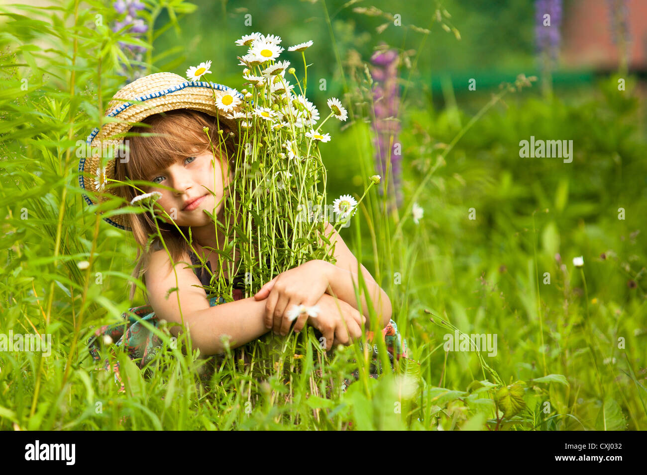 Funny lovely little girl in the park Stock Photo - Alamy