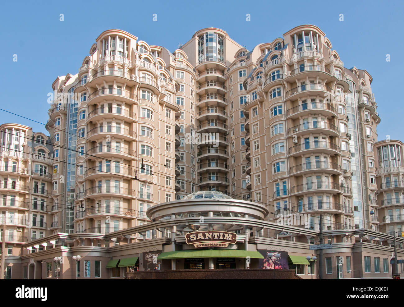 Modern Odessa apartment building with corner Santim Supermarket Stock