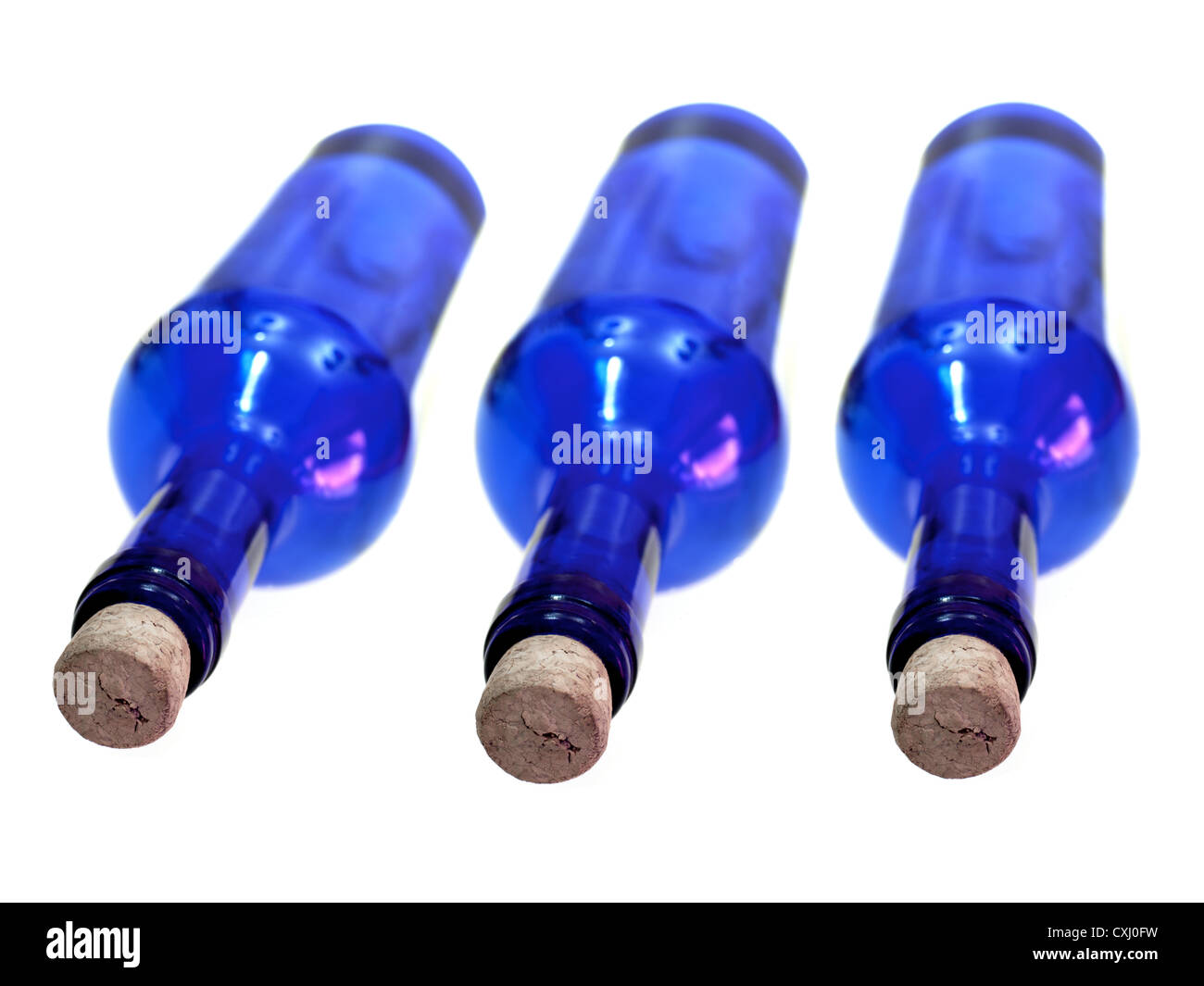 Glass bottles isolated against a white background Stock Photo - Alamy