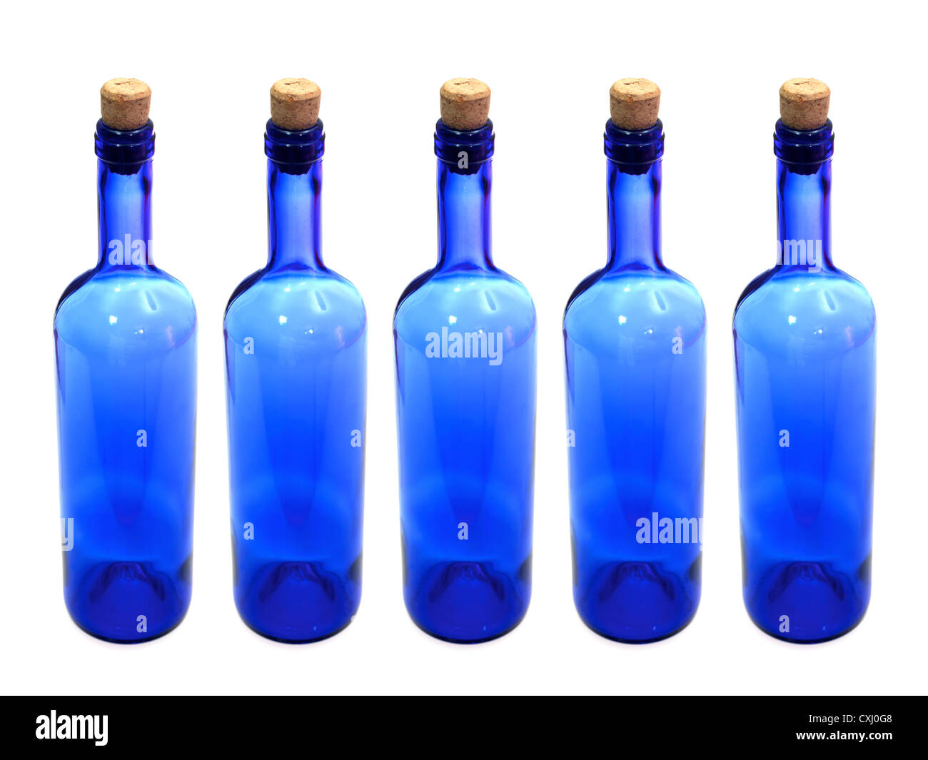 Glass bottles isolated against a white background Stock Photo - Alamy