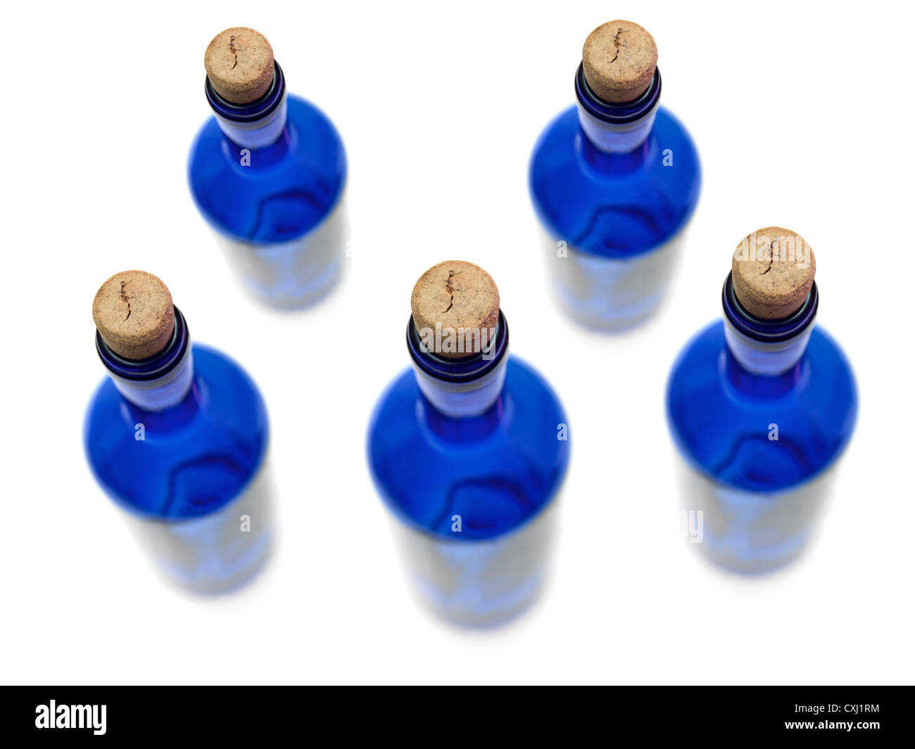 Glass bottles isolated against a white background Stock Photo - Alamy