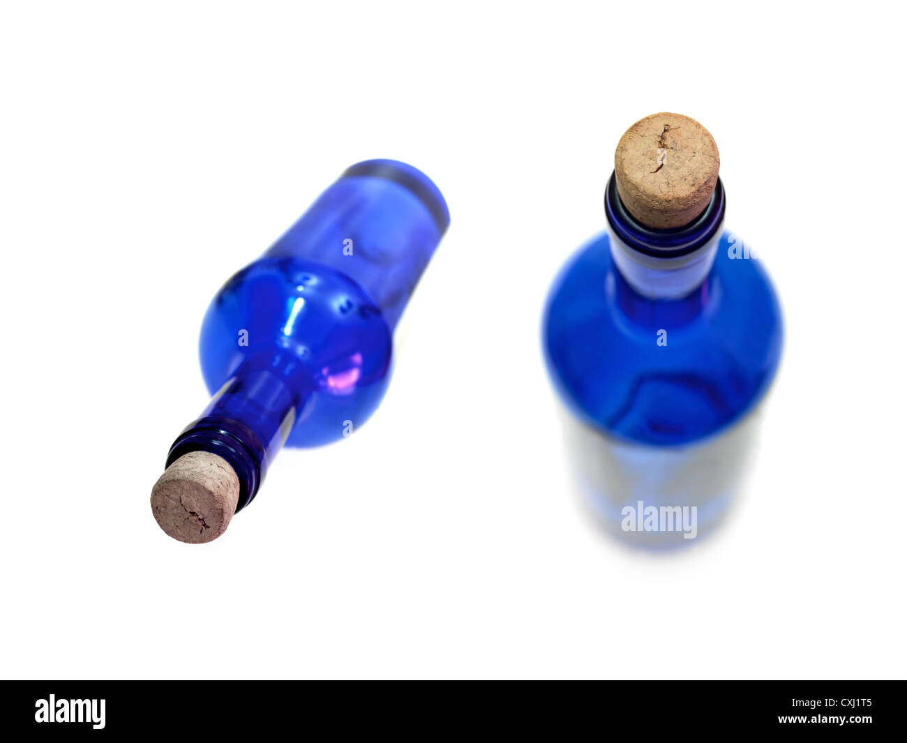 Glass bottles isolated against a white background Stock Photo - Alamy