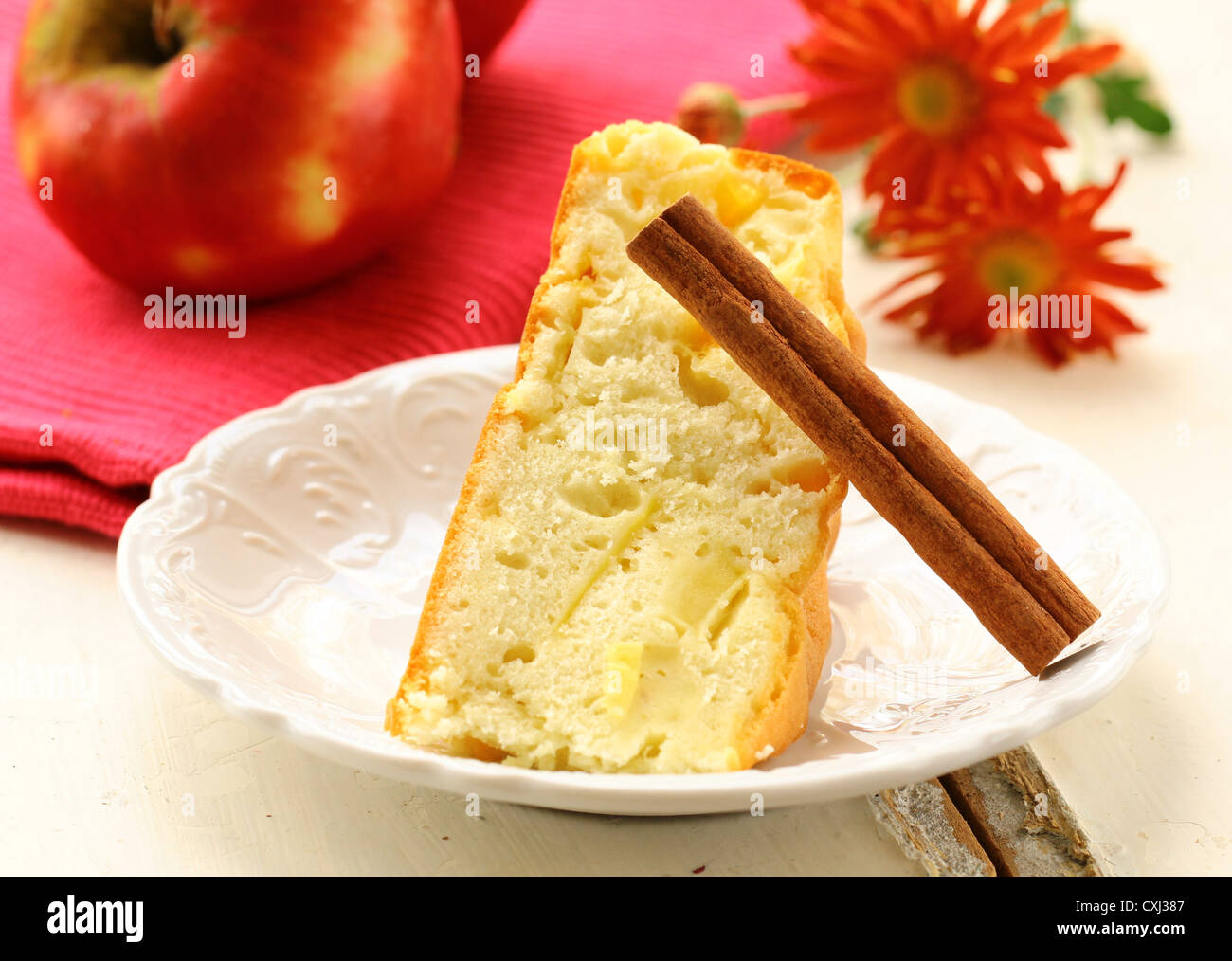 apple pie with cinnamon stick on a white plate Stock Photo