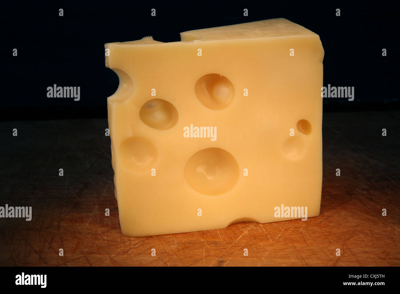 Slice of Emmental Cheese Stock Photo Alamy