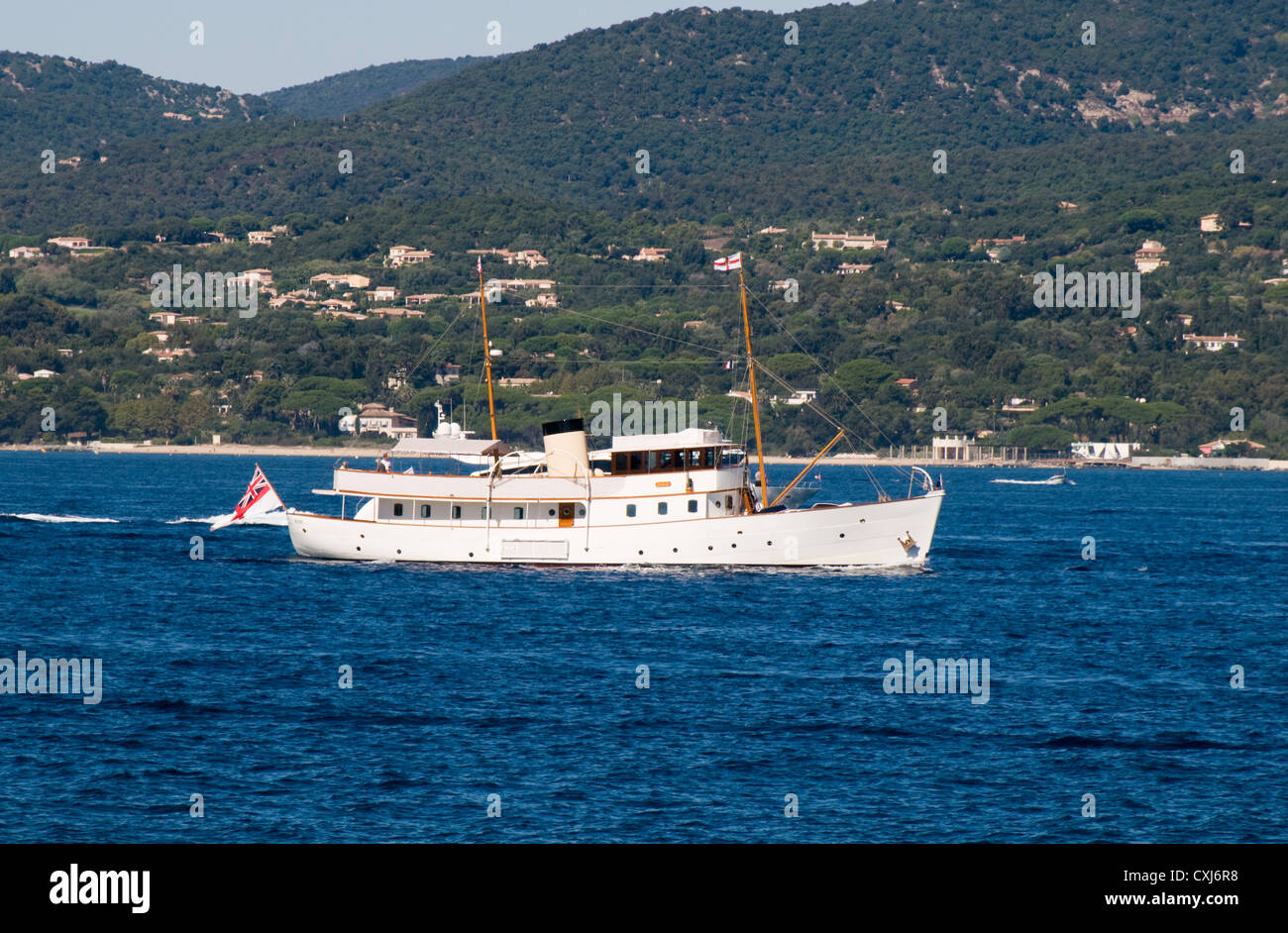 The yacht Bluebird of 1938 sails in the Gulf of St Tropaz on a fine sunny day. She was originally owned by Sir Malcolm Campbell. Stock Photo