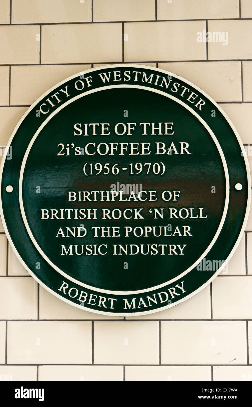 A green plaque commemorating the 2is' Coffee Bar in Soho. Stock Photo