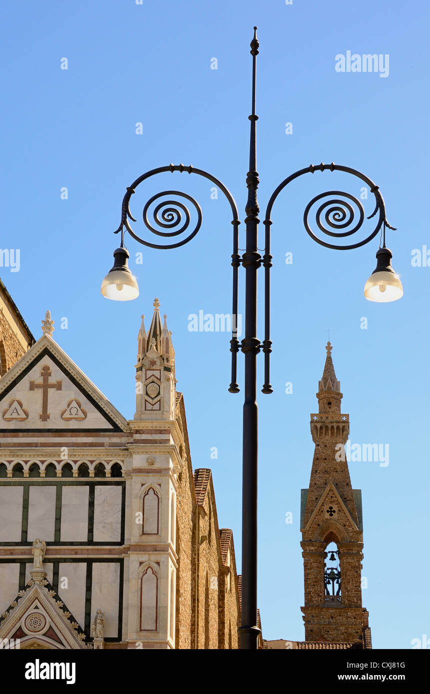 An ornate lamp post outside the Basilica di Santa Croce in Florence, Italy. Stock Photo