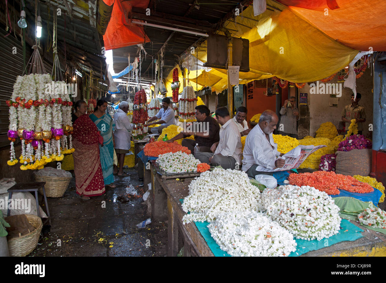 Flower garlands sellers. Devaraja market. Mysore. India Stock Photo