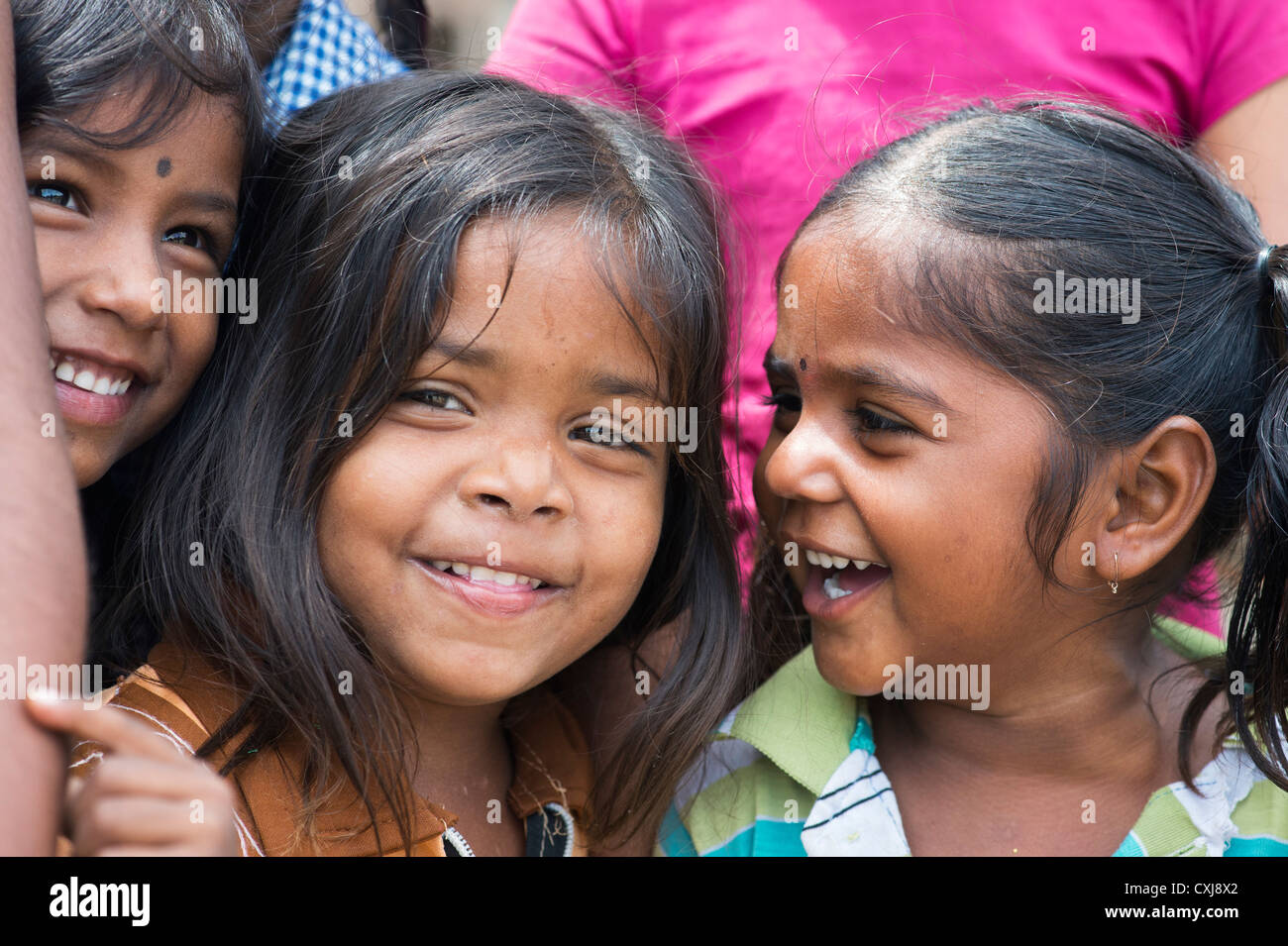Smiling happy young rural Indian village girls. Andhra Pradesh, India Stock Photo