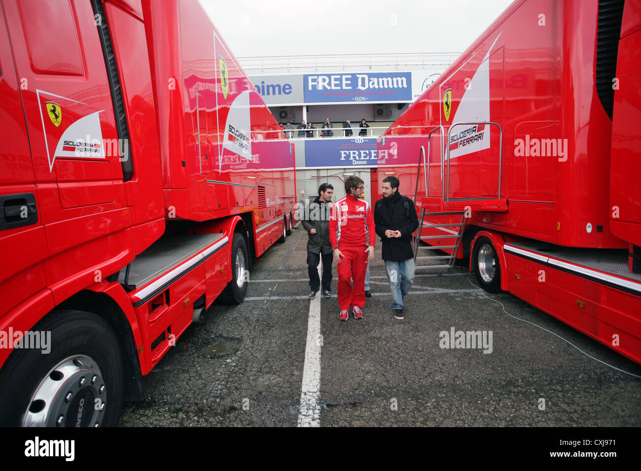 Ferrari Formula One hospitality team vehicles in the paddock at Montmelo circuit, Spain Stock Photo