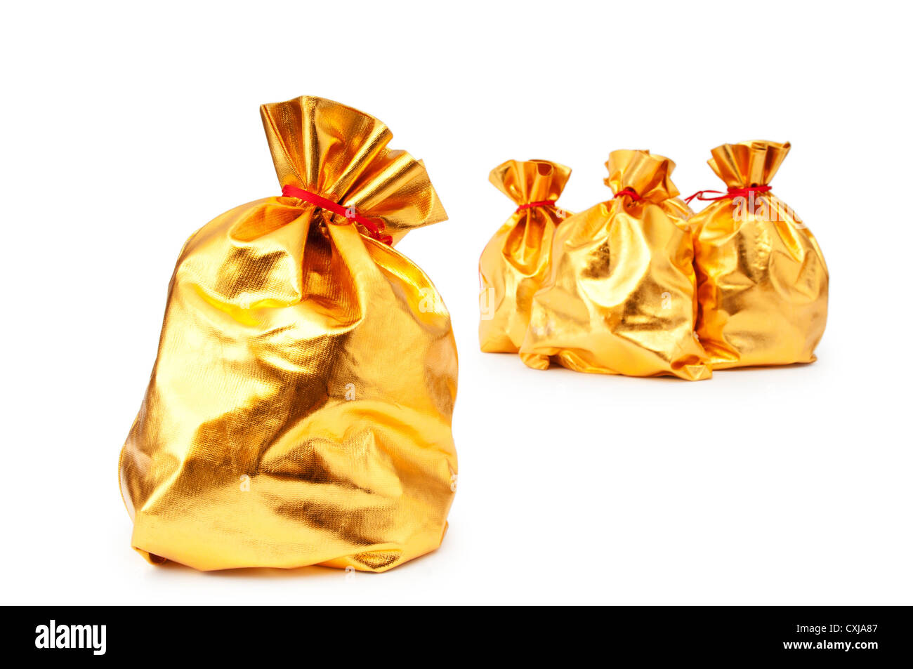 Golden sacks full of something good Stock Photo Alamy