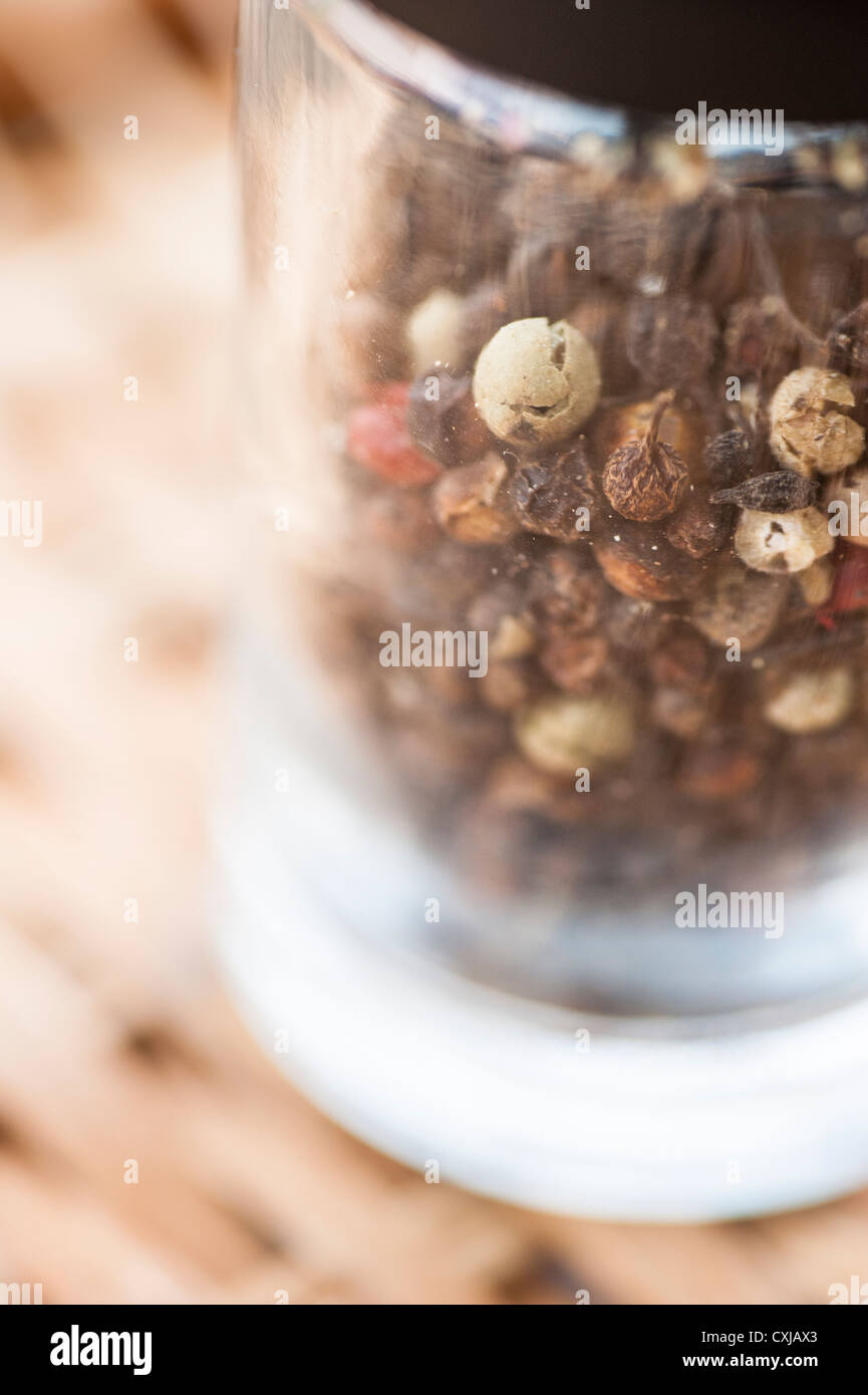 Closeup of mill with peppercorns Stock Photo
