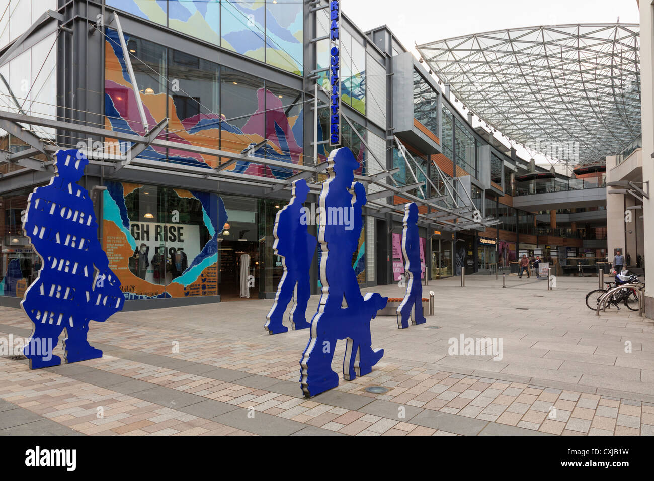 Sculptures at pedestrian entrance to glass-covered shopping centre in Victoria Square Belfast Co Antrim Northern Ireland UK Stock Photo