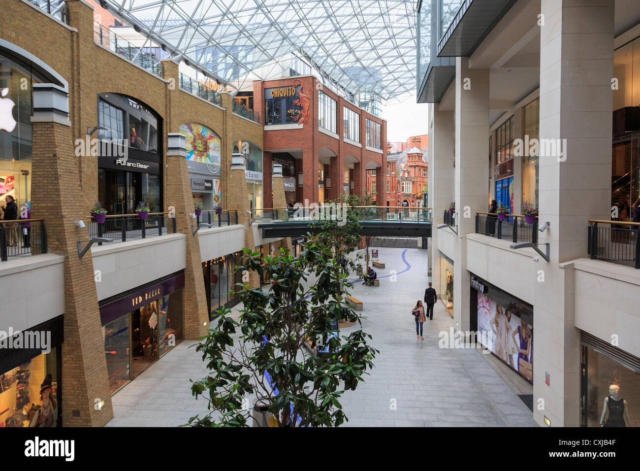 Shops inside the modern glass covered shopping centre in Victoria Square, Belfast, County Antrim, Northern Ireland, UK Stock Photo