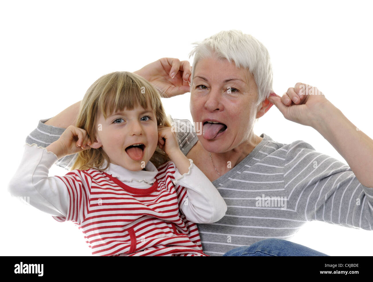 grandma and granddaughter make faces Stock Photo