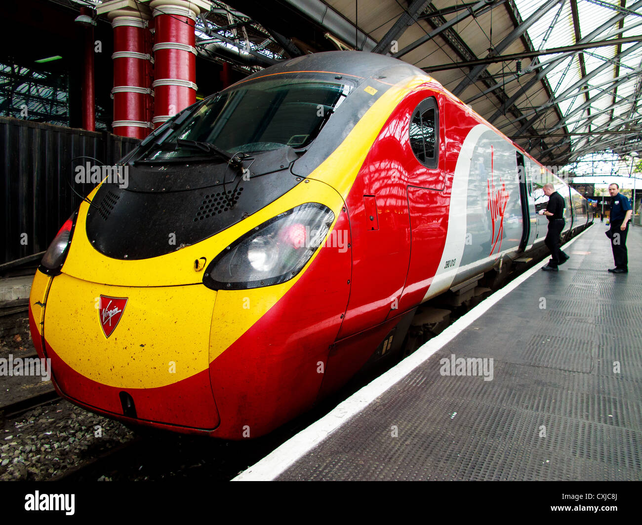 A Virgin trains Pendolino, at Liverpool Lime street Station. Virgin runs 1 train per hour from Euston most days to Liverpool Stock Photo