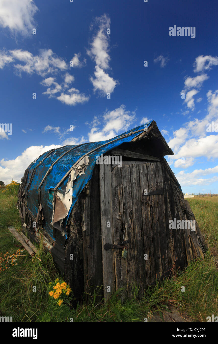 Upturned boat now used as a shed on Lindisfarne, Holy Island. Stock Photo