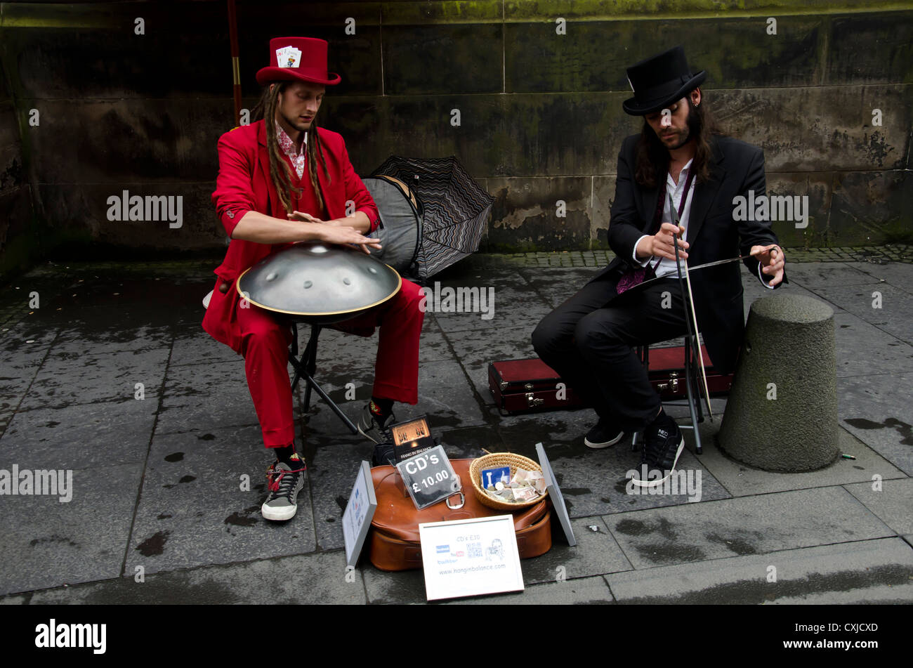 Simple Instrument Busking Saw busker hi-res stock photography and images - Alamy