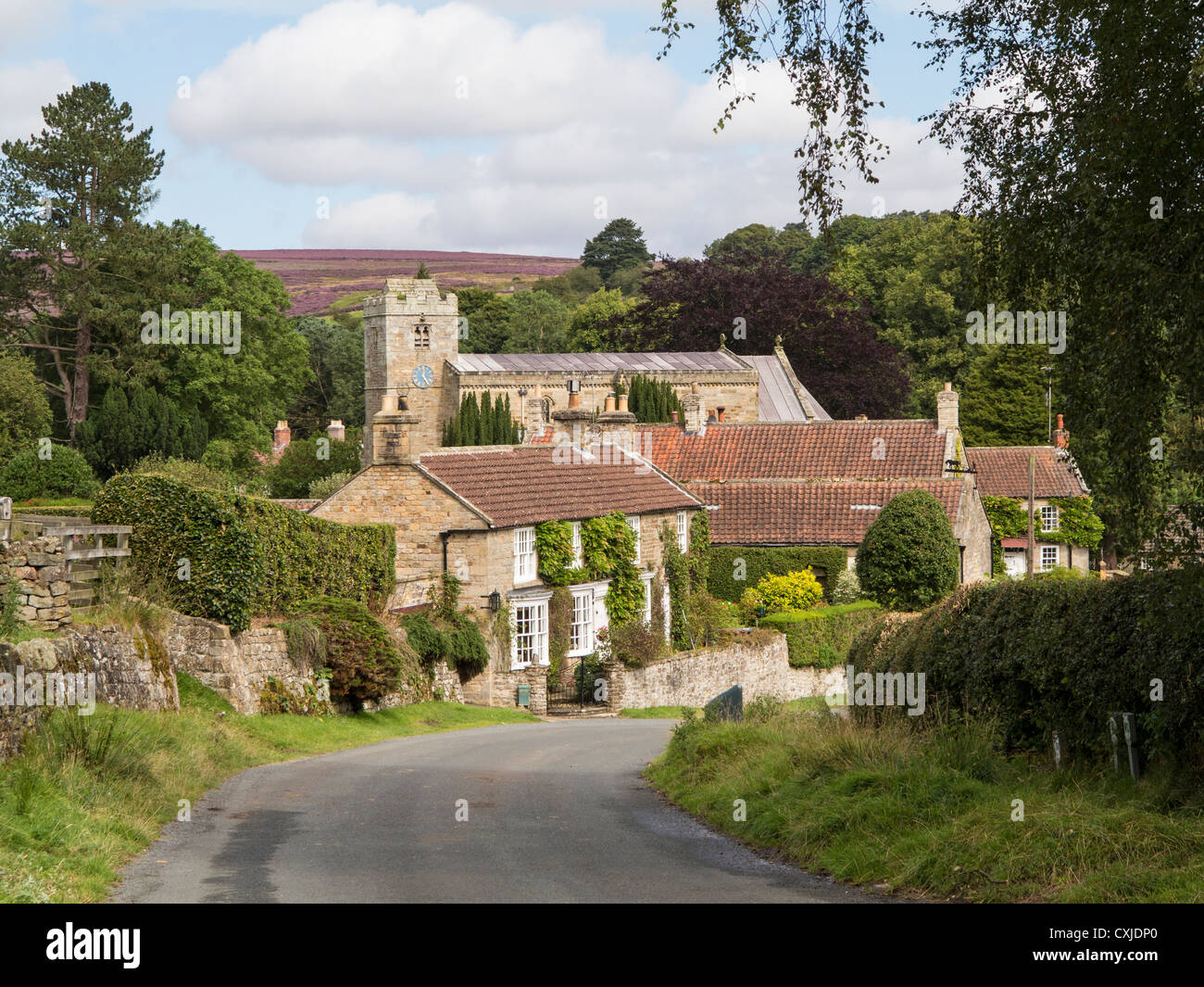 Lastingham village in the North York Moors National Park UK at heather time Stock Photo