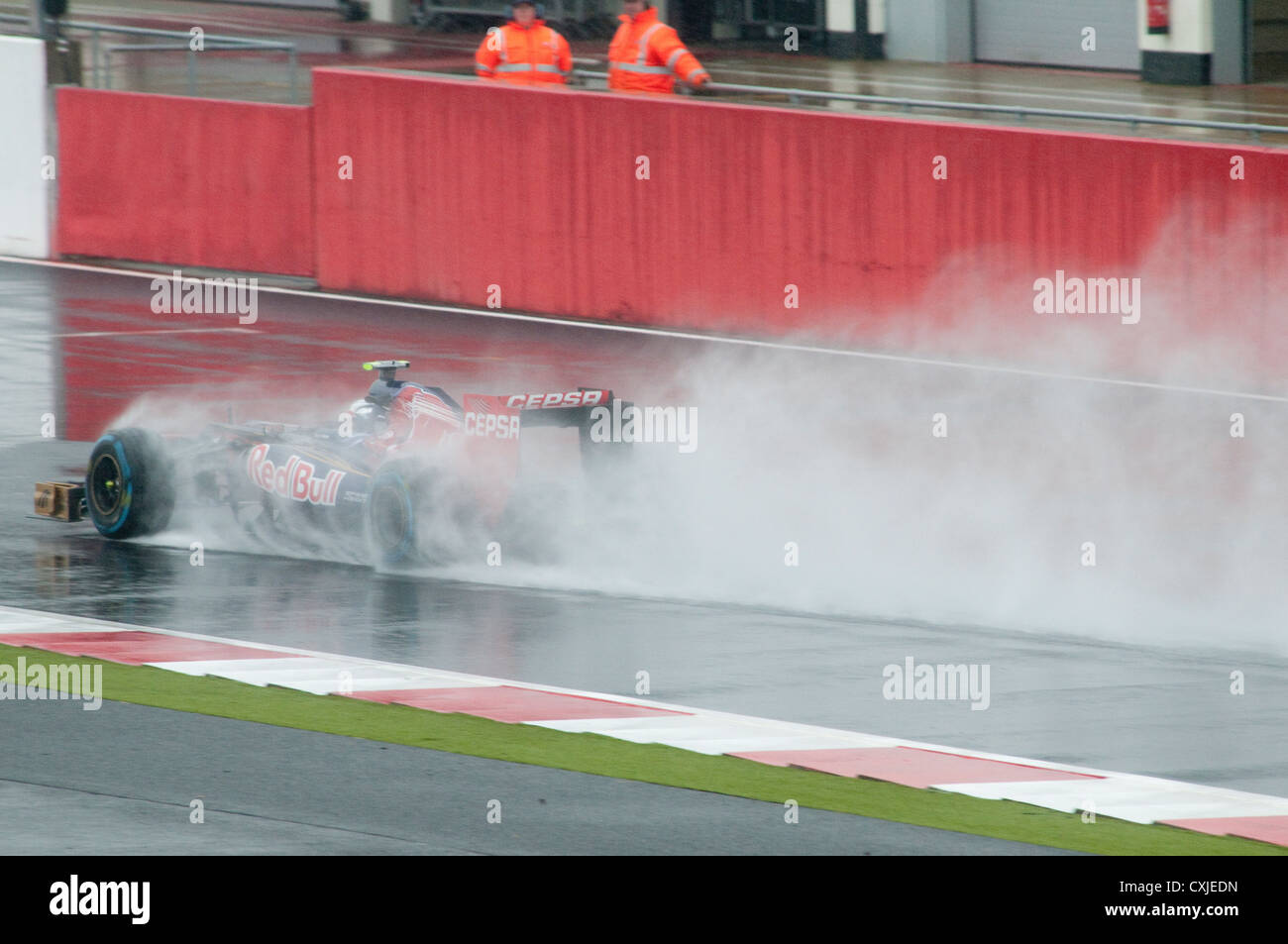Formula One Car in action in the Rain Stock Photo