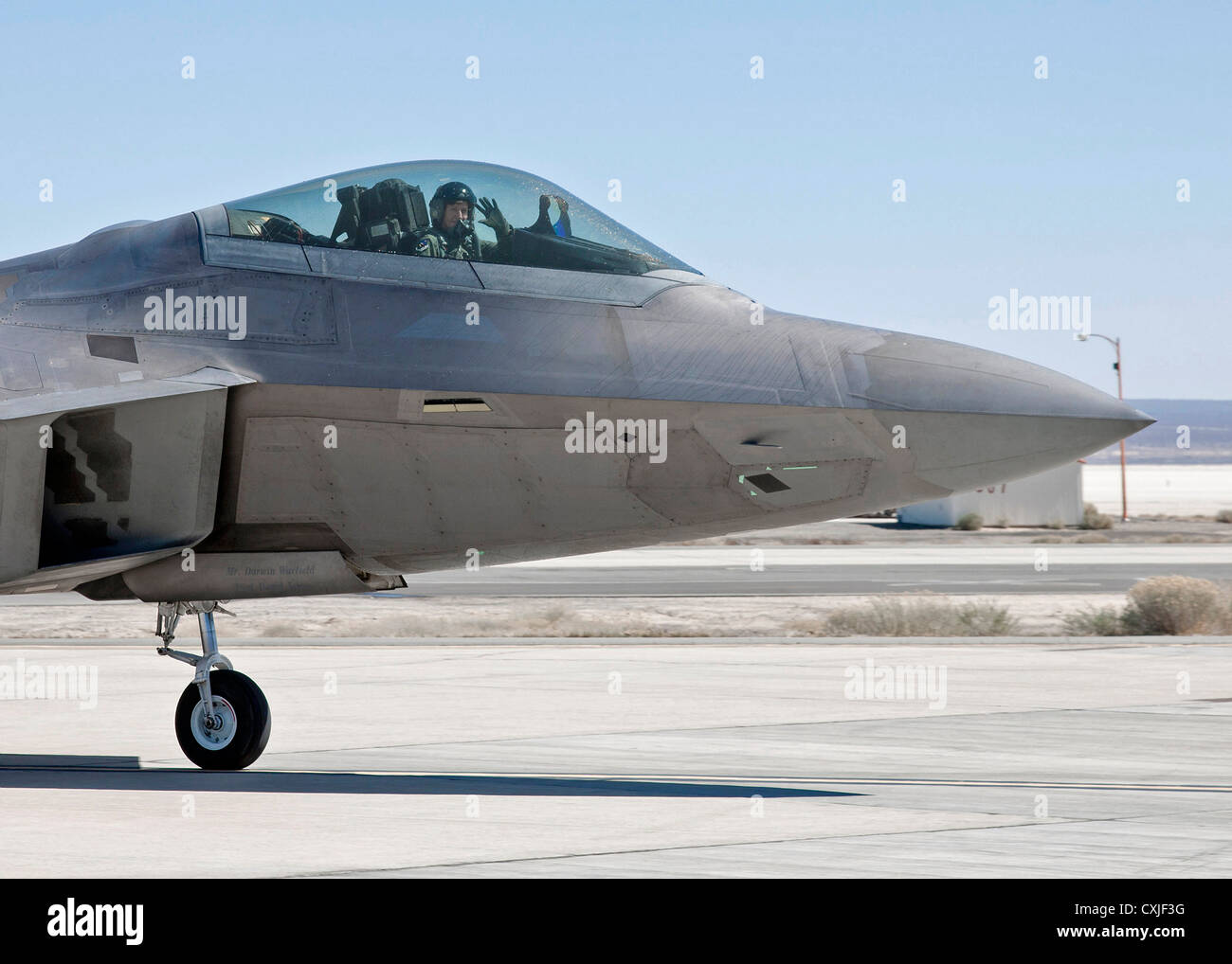 US Air Force F-22 Raptor stealth fighter aircraft taxi's at Edwards Air Force Base March 13, 2012 in Edwards, California. Stock Photo