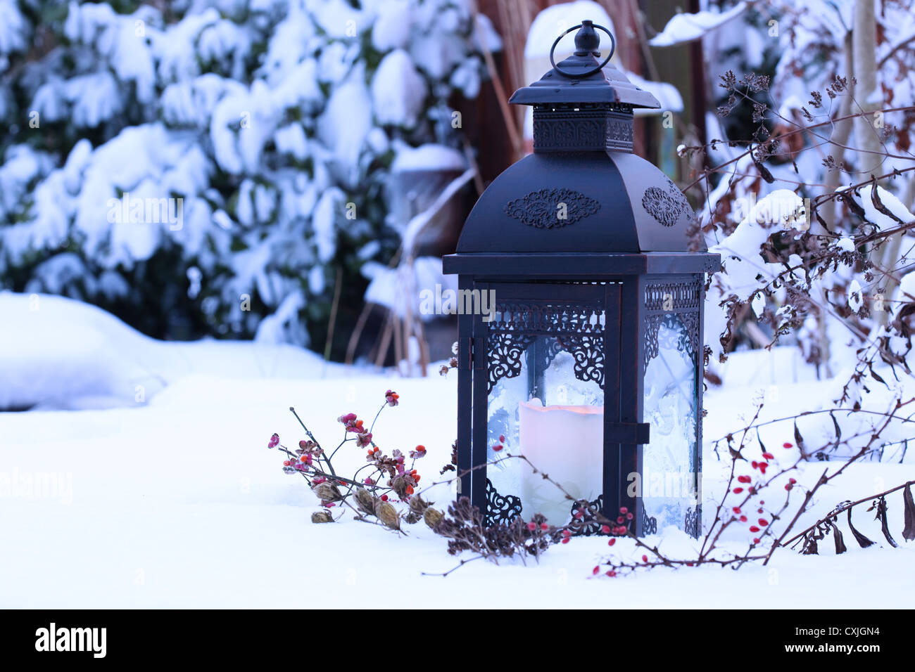 Lantern in the snow.  Laterne im Schnee. Stock Photo