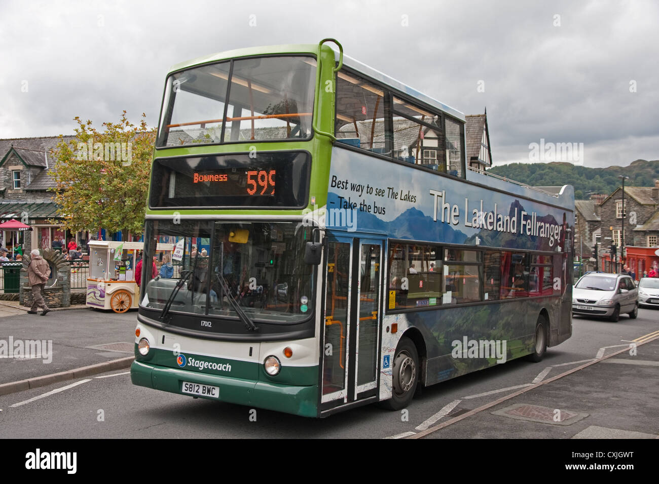 Open top double deck psv bus in Bowness Stock Photo
