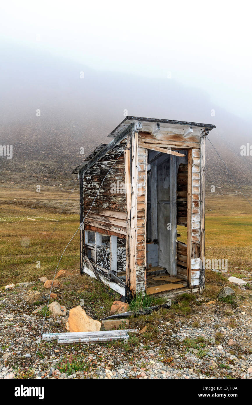 This outhouse is part of remains of RCMP (Royal Canadian Mounted Police) post at Dundas Harbour on Devon Island, Nunavut, Canada Stock Photo