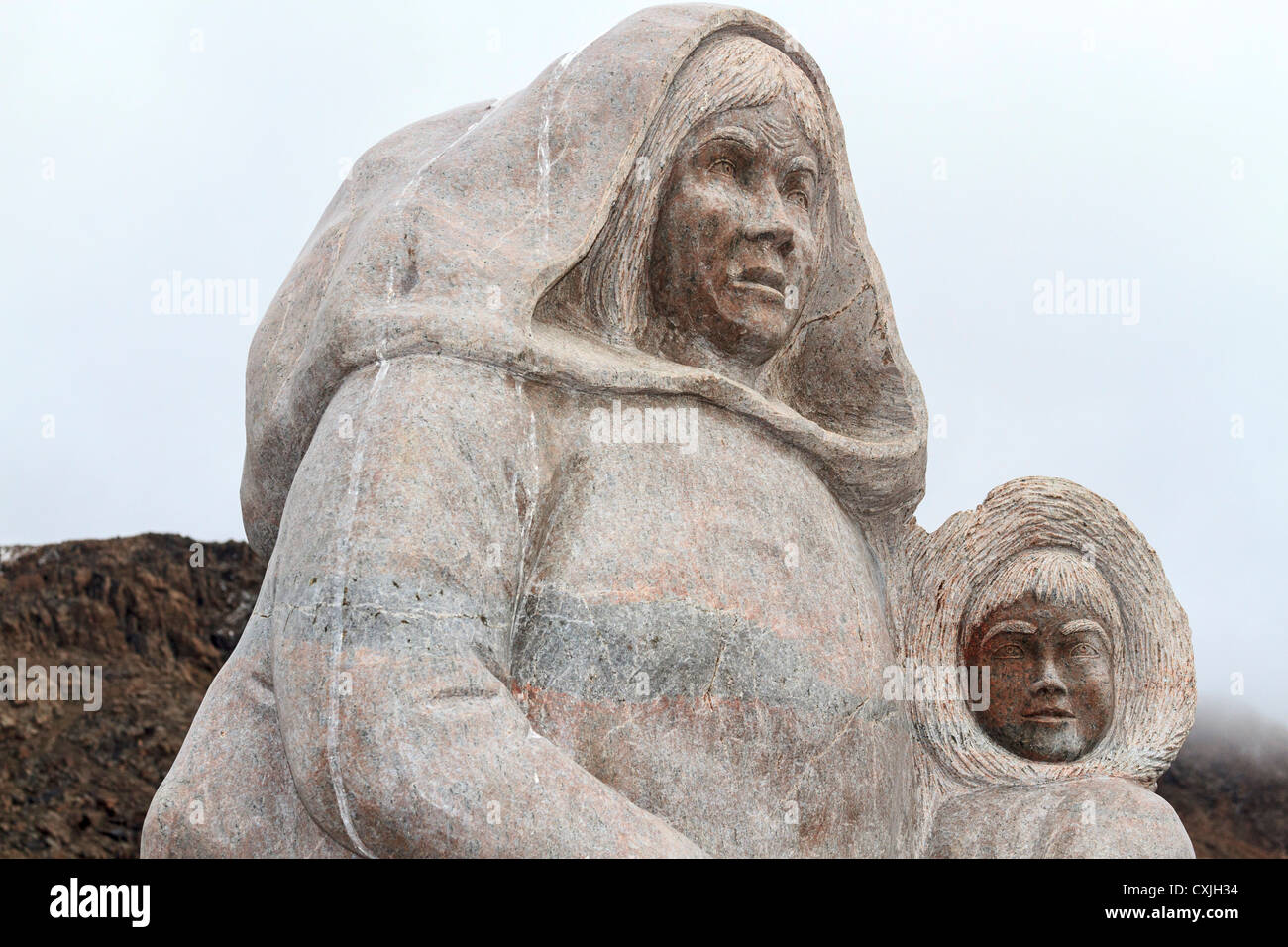 Memorial statue to people who suffered during the resettlement of families to Grise Fjord in the high arctic during the 1950s Stock Photo