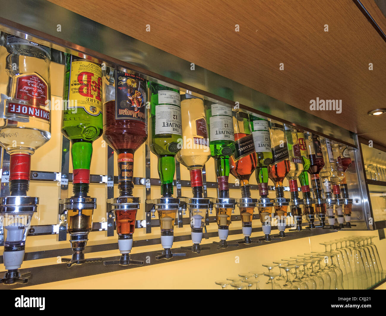 Six varieties of liquor fill 17 bottles in the executive lounge of Pearson International Airport, Toronto, Canada. Stock Photo