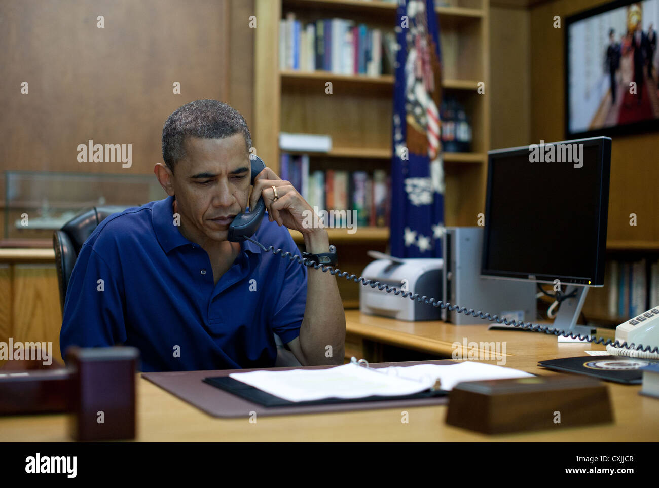 US President Barack Obama holds a conference call August 6, 2011 from Camp David on the tragedy in Afghanistan with Defense Secretary Leon Panetta, Adm. Mike Mullen, Chairman of the Joint Chiefs of Staff, National Security Advisor Tom Donilon and Chief of Staff Bill Daley. Stock Photo