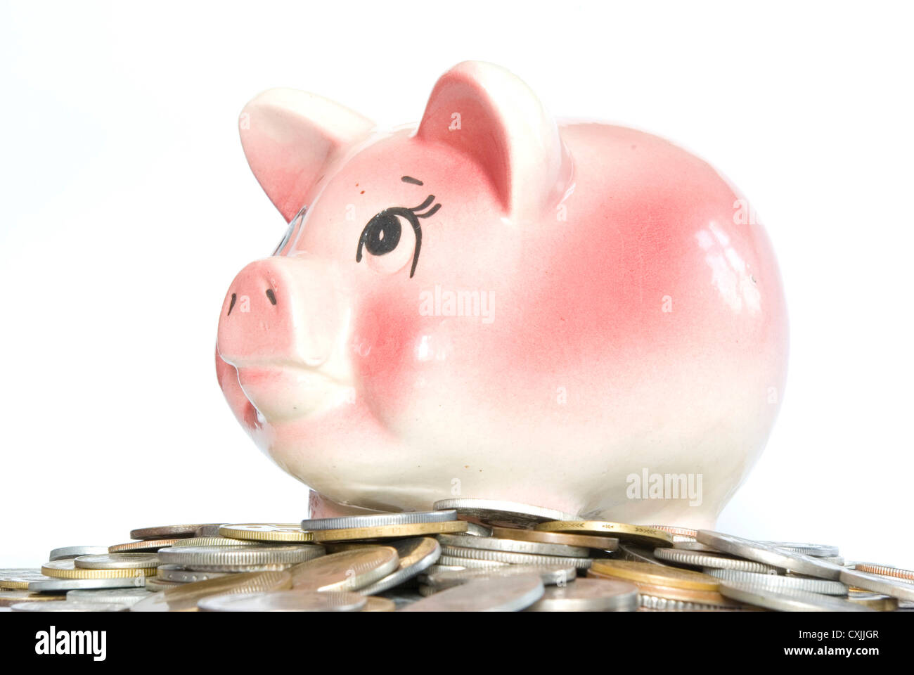 Pink piggy bank isolated on white background with coins Stock Photo - Alamy