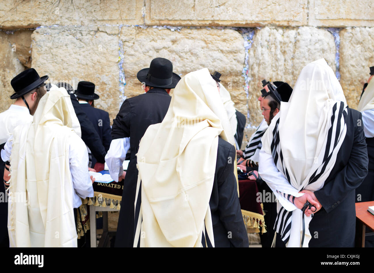 Hasidic Jews pray at the Western Wall in Jerusalem, Israel. Stock Photo