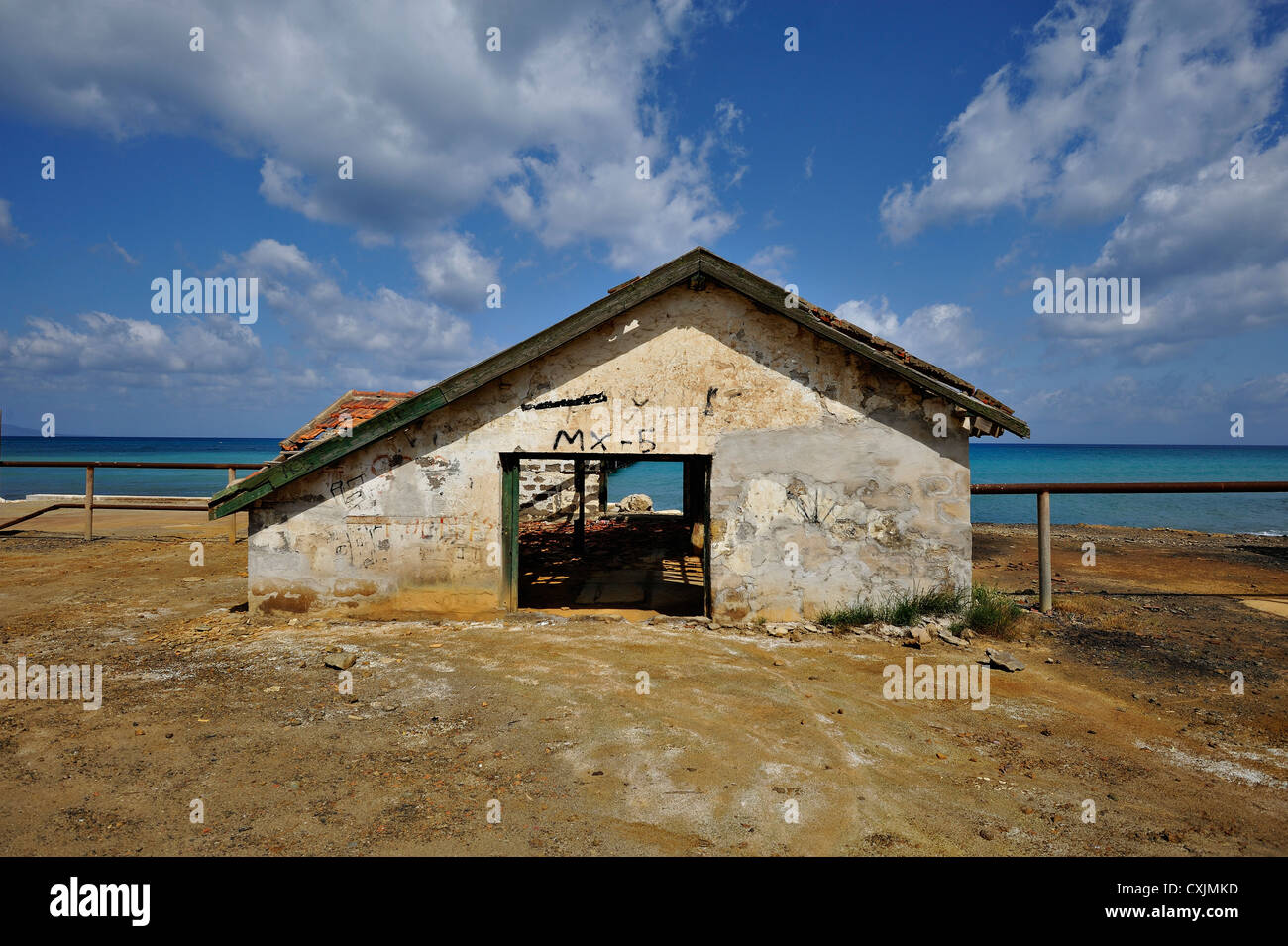 Burned and abandoned cafe on the Mediterrean coast near the town of Polis in north-west Cyprus Stock Photo